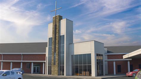Modern church very close to a mall .